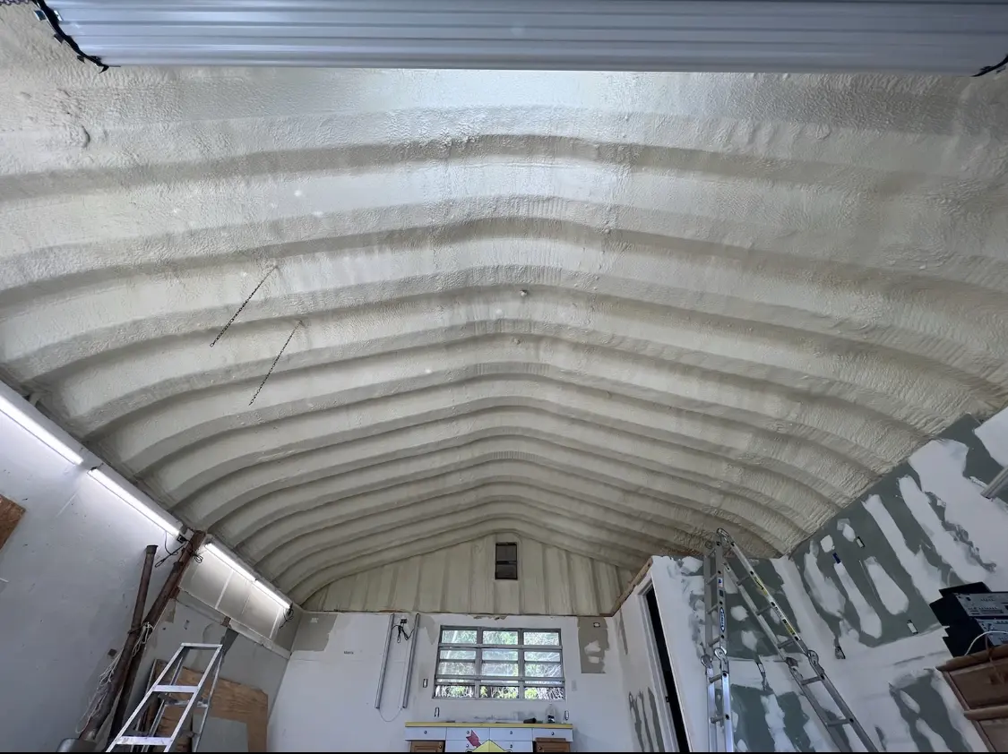 Spray polyurethane foam applied to the underside of a metal roof deck in South Bend